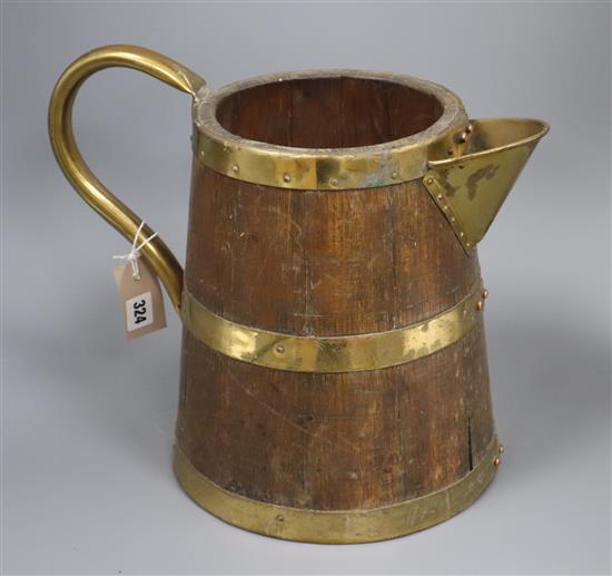 A Victorian brass bound staved wood jug